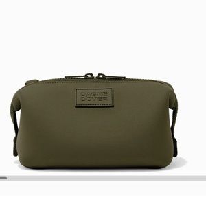 Dagne Dover dark moss green toiletry bag. Size small. Small water stain